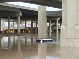 Illustration for article titled Turn Around Don't Drown: Houston Street Flooding Mega-Gallery